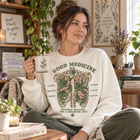 Good Medicine T-Shirt — Botanical Rib Cage Graphic, "Natural Healing for a Brighter You" – view 1